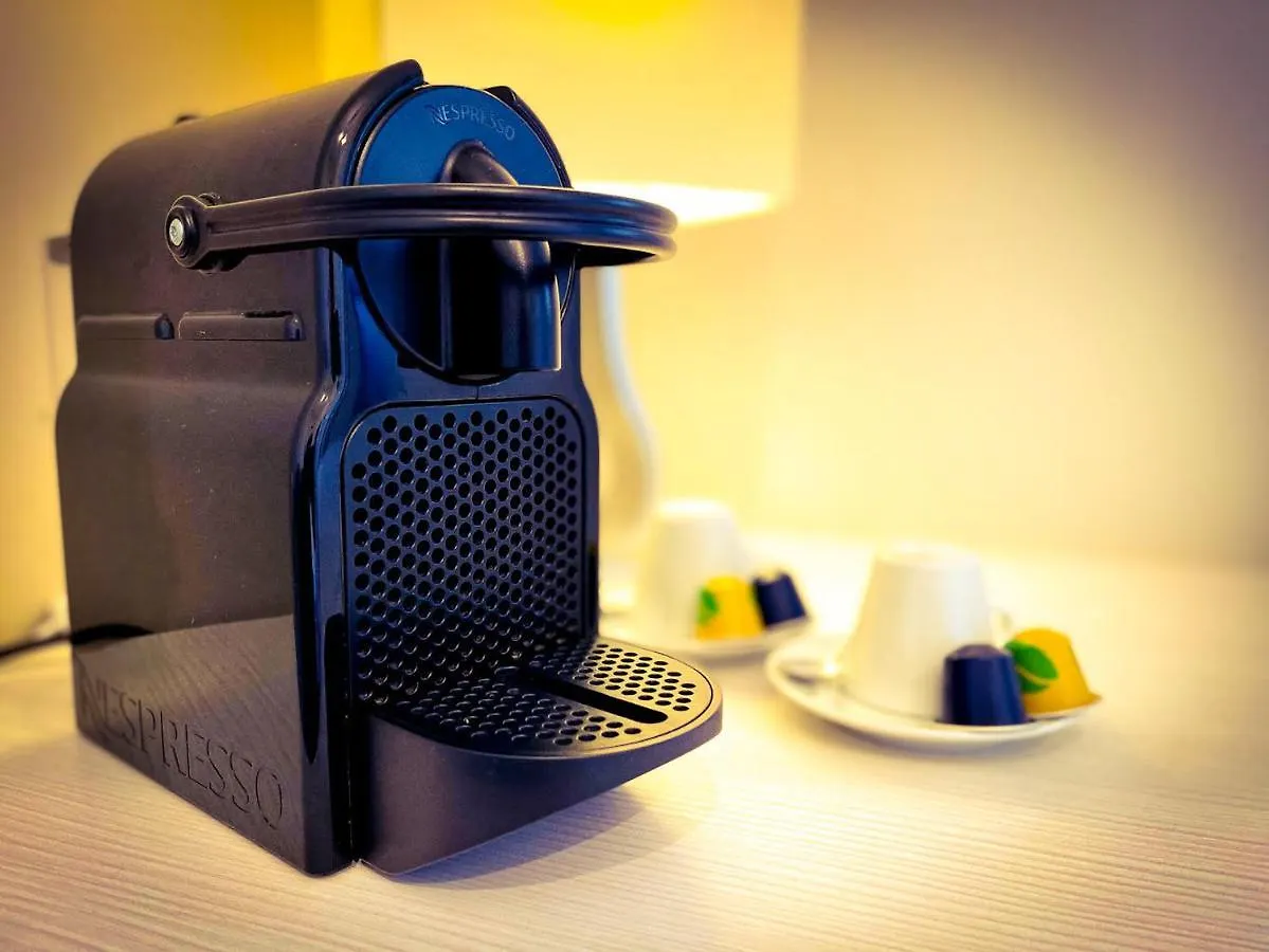 Charming Bellagio Boutique Hotel Couette-café